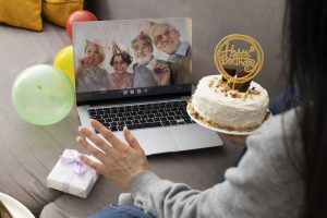 high-angle-woman-holding-birthday-cake