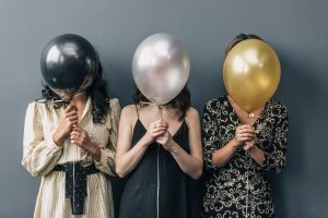 party-balloons-in-front-of-faces